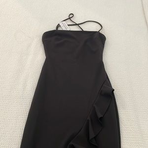 Windsor Black Midi dress with side slit and ruffles. Size S. Never been worn.